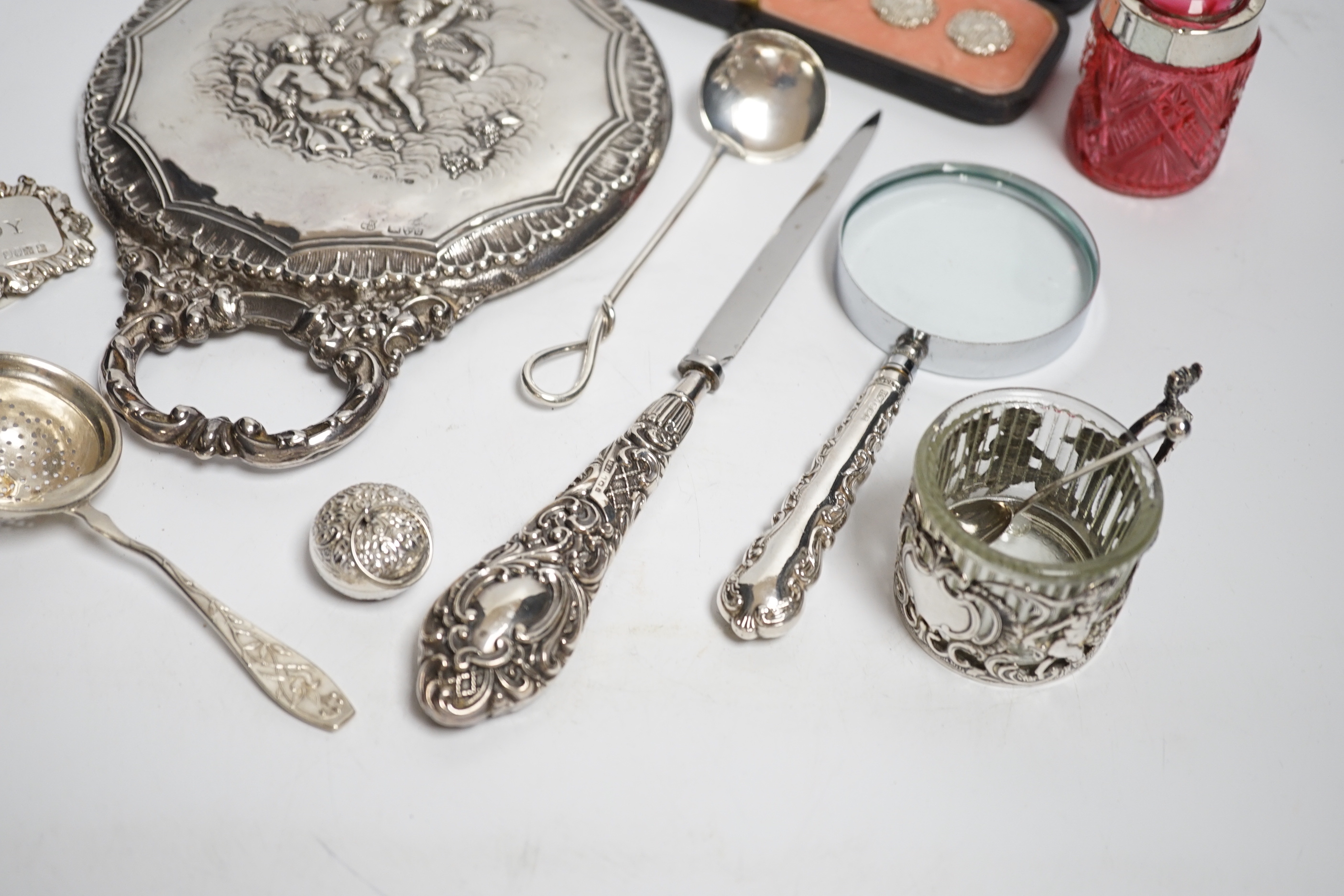 Sundry small silver including a cased set of six late Victorian silver buttons, Birmingham, 1900, a George V silver rattle bell, a silver hand mirror, wine label, scent bottle, etc.